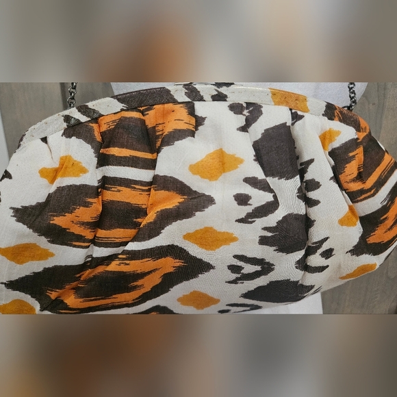 K.C.MALHAN Ikat Printed Woven Cloth Dumpling Chain Bag In Orange/brown Multi. - Picture 4 of 11